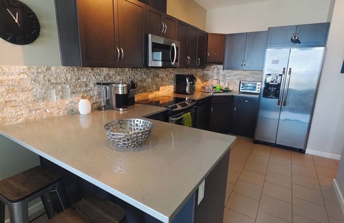 Victoria Park Apartment | New downtown penthouse 1 bedroom with unblock view by Stampede BMO Saddle dome