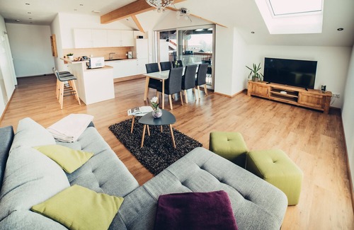 Berghof Condo | New dream apartment with views over the Bannwaldsee in the Allgäu mountains.