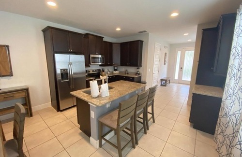 West Kissimmee Villa | NEW! Elegant 8BR Retreat w/Private Pool, Spa & Family-Friendly Comfort