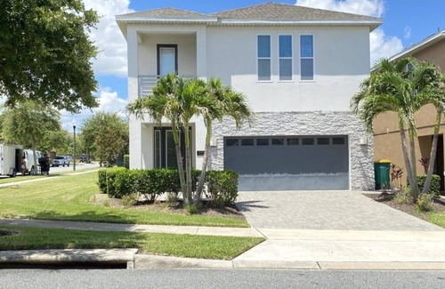 West Kissimmee Villa | NEW! Elegant 8BR Retreat w/Private Pool, Spa & Family-Friendly Comfort