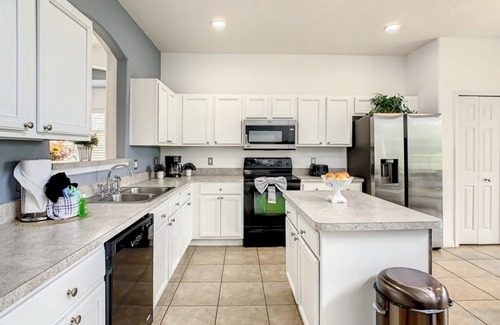 West Kissimmee Villa | NEW! Elegant Emerald Island Getaway – Pool, Spa & Games Close to Disney!