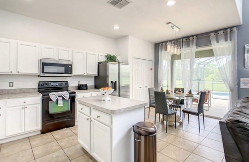 West Kissimmee Villa | NEW! Elegant Emerald Island Getaway – Pool, Spa & Games Close to Disney!