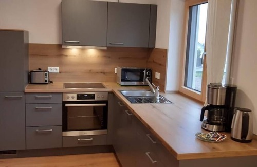 Michelsneukirchen Apartment | New, exclusive vacation apartment (60 sqm) for 4 people with private garden and barbecue facilities