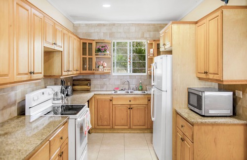 Gambier House | NEW Gated Beach front Condo