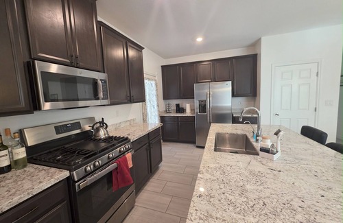 North Las Vegas House | New Gated Luxury: Modern gated 2 bed 2 bath home with soaking Tub, Patio, BBQ.