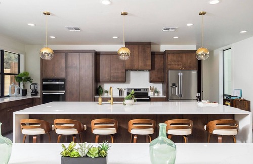 Concan House | NEW Glam Luxury Home by River! Heated Pool Hot Tub Movie Room Firepit Sleeps 24