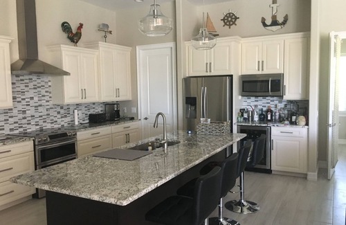 South Gulf Cove House | New gorgeous home on canal close to Gulf beaches