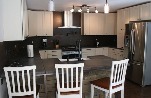 Old Town Condo | New Ground Level Riverfront Suite - Walk to Village!