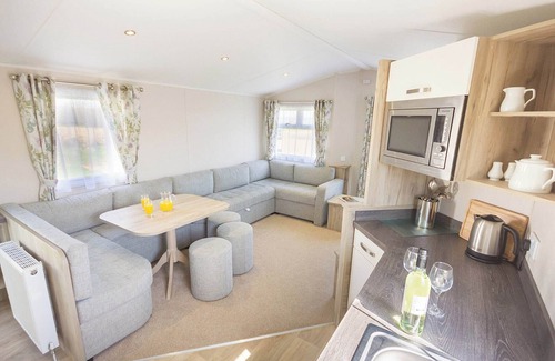 Rookley House | New in 2018. 12ft-wide contemporary caravan with one double and two twin.