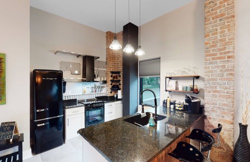 Tampa Heights Apartment | NEW industrial style micro-loft in a quiet neighborhood and walkable to FUN!