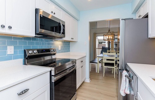 Caine Woods Condo | NEW LISTING as of 5/30/24 with pool + tennis courts too!nSpacious and ALL new!
