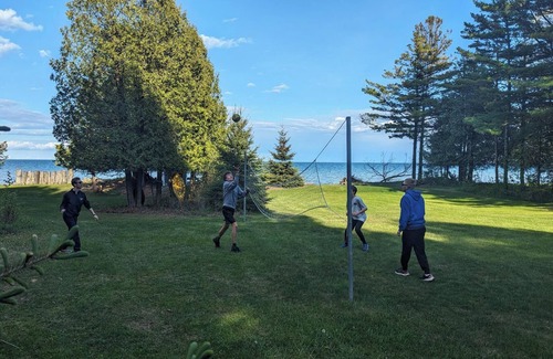 Cleveland House | New Listing: Lake Michigan beach home: kayaks, games, PS5, foosball, volleyball