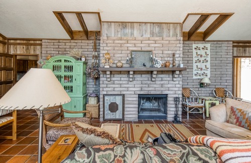 Angel Fire House | New listing! Lovely home filled with character w/ cozy fireplace and large patio