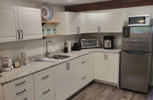 Courtenay House | New Listing -SPECTACULAR 3 acer 4 BR 2 seperate suite private oasis with it all