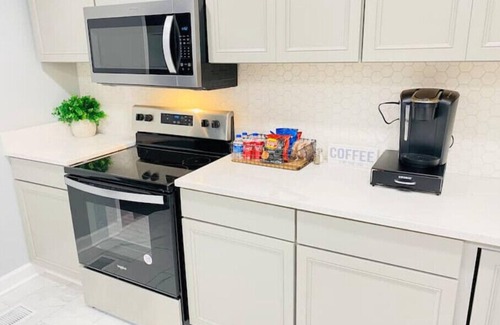 Covington House | “New Listing” The Latest Luxurious Blue Cheetah! 4Bed 3Bath