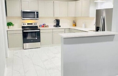 Covington House | “New Listing” The Latest Luxurious Blue Cheetah! 4Bed 3Bath