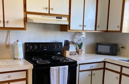 Tamuning Condo | NEW lovely 2-bedroom condo with parking + laundry