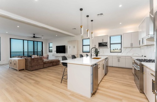 Port Isabel House | NEW Luxury 4,000 SF Waterfront Home, With Pool, Sleeps 20