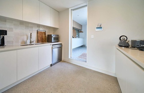 Bouvet Island House | New Luxury Home with pool - Sleeps 12 walking distance to shops & beaches!