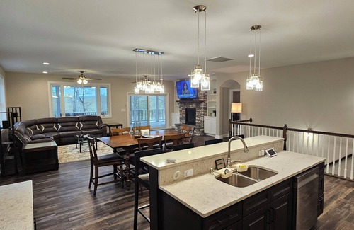 Livingston House | New Luxury Lakefront Getaway! Panoramic Views, New Hot Tub, Game Room & Kayaks!