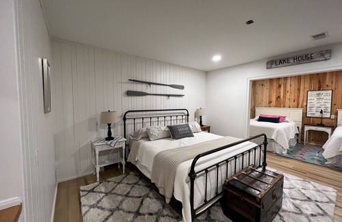 Redgranite Cabin | New! Luxury Lakefront Lodge - Pier, Beach, Boats, Hot Tub, Fire pits, Fireplaces