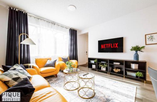 Southwest Edmonton Apartment | NEW-Luxury Retreat-Hot Tub-King Bed-AC-EV Charger