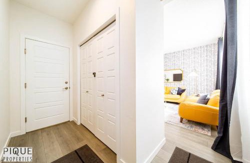 Southwest Edmonton Apartment | NEW-Luxury Retreat-Hot Tub-King Bed-AC-EV Charger