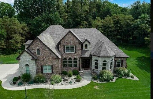 South Bend House | NEW! Luxury throughout. Sleeps 12. Just 5 miles to ND. Theater. Bar. Hot Tub.