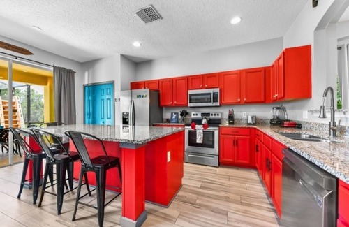 West Kissimmee Villa | NEW! Mickey's Island Escape - 6 Bedroom w/Pool Slide