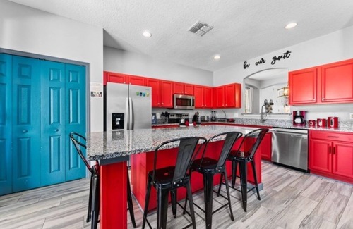 West Kissimmee Villa | NEW! Mickey's Island Escape - 6 Bedroom w/Pool Slide
