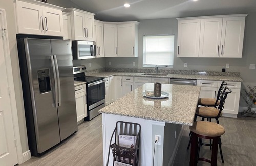 Indian River Estates House | New modern 3-bed 2 bath house with smart TV's in every room, WIFI, and hot tub