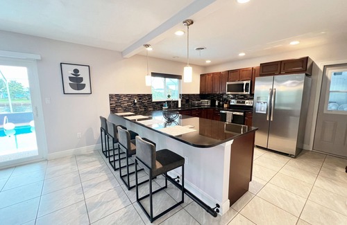 Edgewater House | NEW MODERN 3BR/2BA WATERFRONT HEATED POOL DOCK PATIO DIRECT GULF ACCESS BEACH