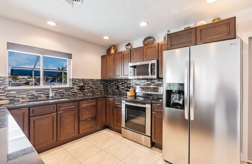 Edgewater House | NEW MODERN 3BR/2BA WATERFRONT HEATED POOL DOCK PATIO DIRECT GULF ACCESS BEACH