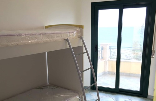 Brancaleone House | New modern beachfront townhouse on pristine private beach
