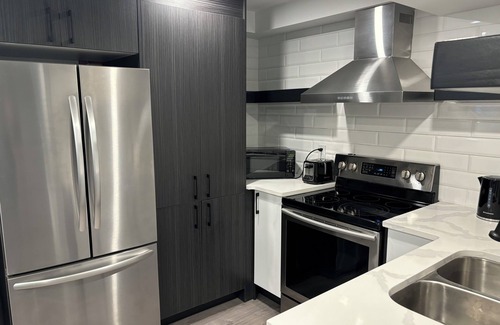 Kitchener Apartment | New Modern bright two bedroom lower level duplex with salt water pool!