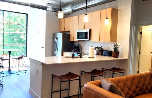 Traverse City Condo | NEW Modern Condo, King Beds, Rooftop Hot Tubs, Near Downtown, Quiet!