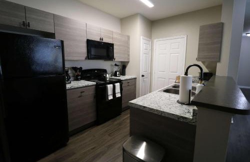 Pembroke Apartment | New Modern Stay Across from UNC-P with Pool & Gym