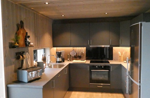Etnedal House | New mountain cabin with panoramic view, sauna, ski-in -ski-out