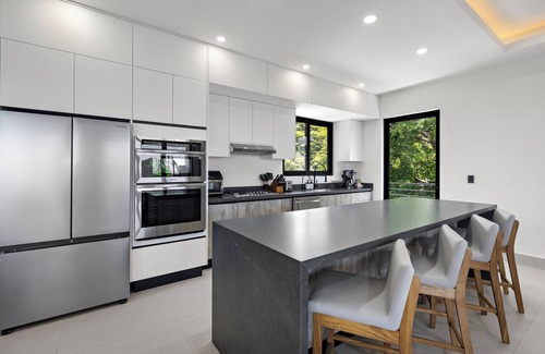 Coco House | NEW Oceanview Home - Two Terraces - Five Primary Suites - Smart TVs + Foosball - Gated Entry