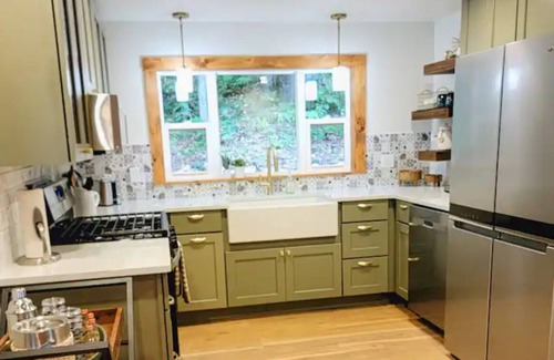 Lake Tomahawk House | NEW! Renovated Bungalow steps from Lake Tomahawk - King Bed, Dock Space, Firepit