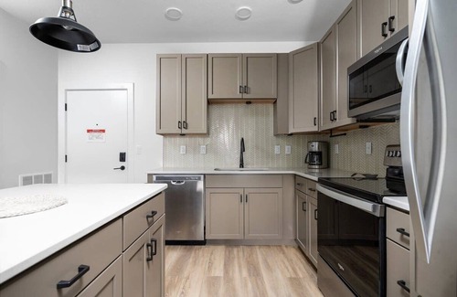 Traverse City Condo | NEW Slabtown Suites on Front Street Unit 202