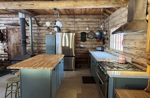 Land O Lakes Cabin | New! Sleeps 15 Level lawn to lake. Sandy beach. Two docks. Great fishing.