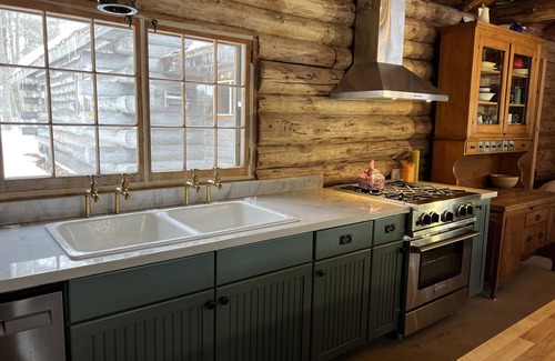 Land O Lakes Cabin | New! Sleeps 15 Level lawn to lake. Sandy beach. Two docks. Great fishing.