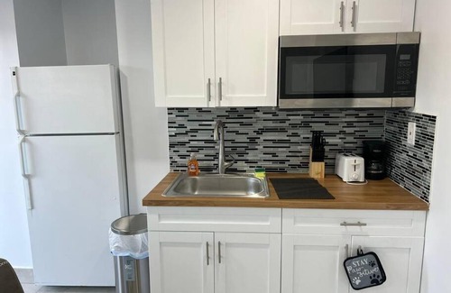 Royal Poinciana House | New Stylish One Bedroom Close to Beach and Hard Rock #21-A