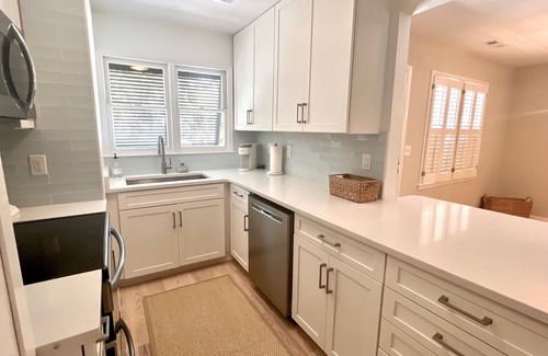 Sealoft Villas Cottage | New to Market. Golf & pond views. Refined beach cottage.