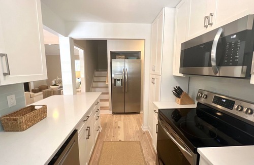 Sealoft Villas Cottage | New to Market. Golf & pond views. Refined beach cottage.