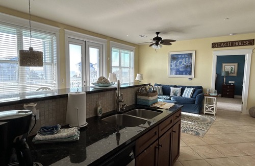 Galveston Condo | New to rentals at Pointe West. On the Sunset Pool/Lazy River and viewing WestBay