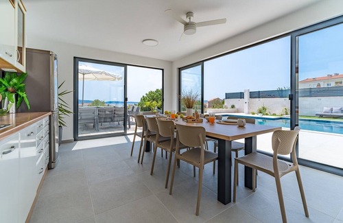 Kastel Kambelovac Villa | NEW! Villa Marisa with 51sqm heated, private pool, 5 bedrooms, 4 bathrooms, summer kitchen, views of the Adriatic sea and town Split