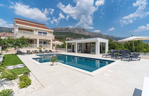 Kastel Kambelovac Villa | NEW! Villa Marisa with 51sqm heated, private pool, 5 bedrooms, 4 bathrooms, summer kitchen, views of the Adriatic sea and town Split
