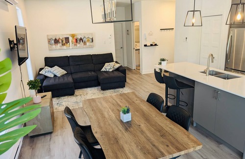 Sainte-Catherine Condo | Newly built condo, with excellent natural light, 20 minutes from the airport.